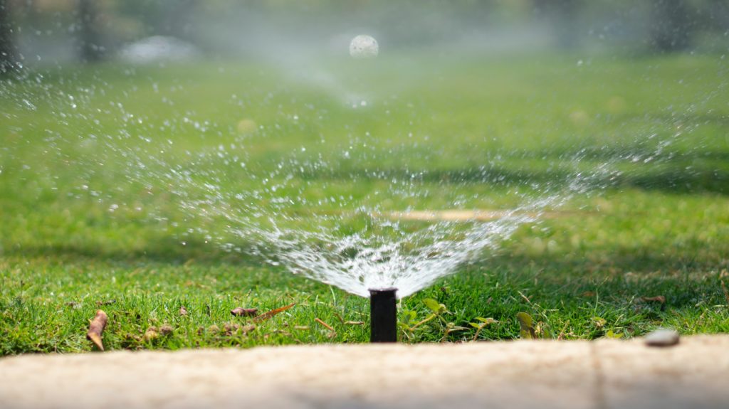 Sprinkler-Grass-Down_to_Earth_Soil_and_Sprinkler_Repair